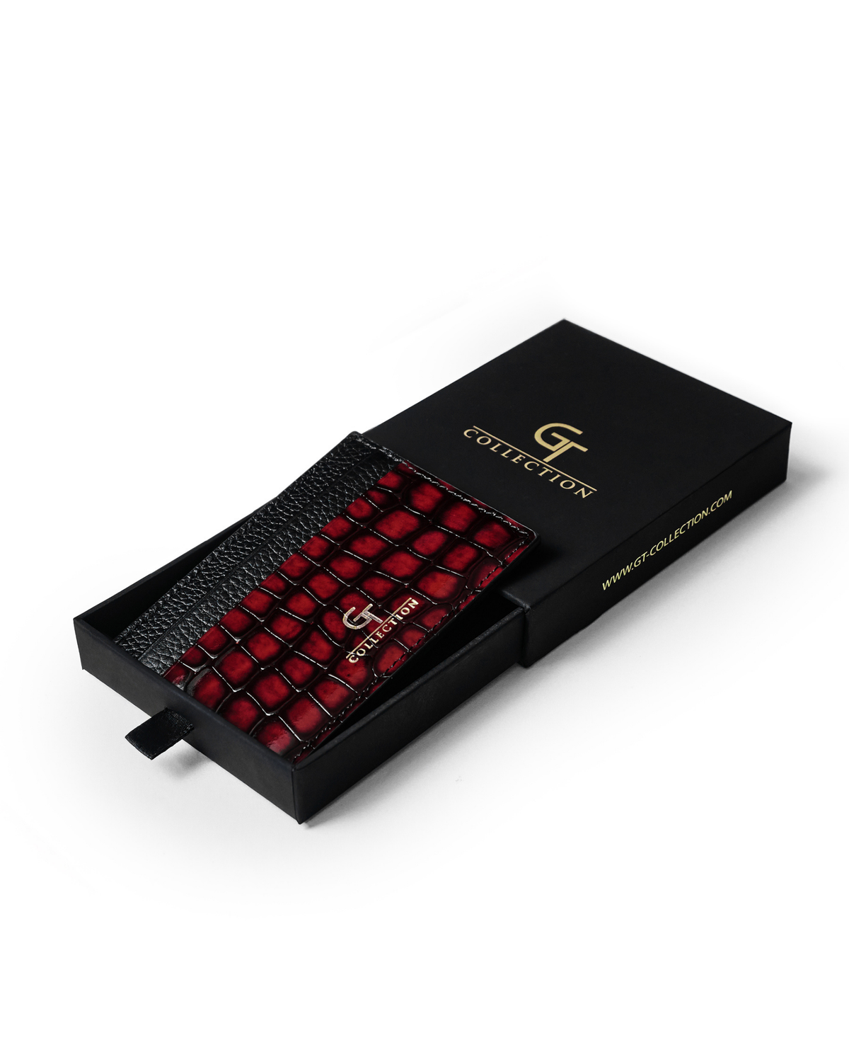 Red croc-embossed leather card holder in gift box with gold logo.