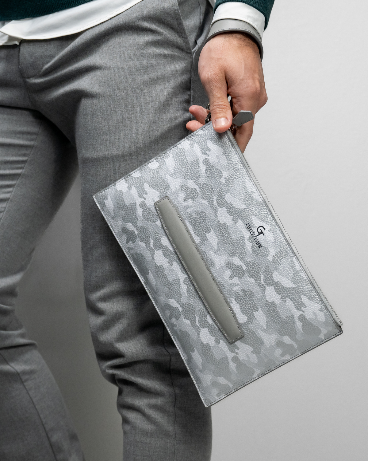 Camouflage leather pouch with zip closure and long inner pocket detail