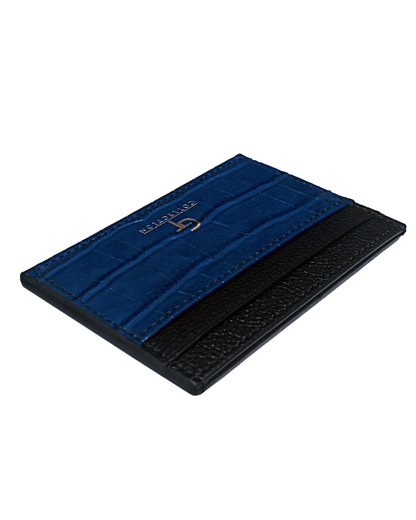 Blue croc-embossed leather card holder open view with black leather backing.