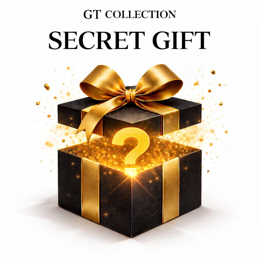 Black gift box with gold ribbon and question-mark emblem Glavna slika izdelka
