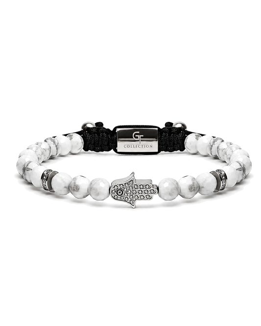 White howlite bead bracelet with black cord and engraved hamsa hand charm