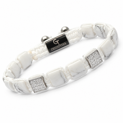 White flat bead bracelet with silver charm tag and square crystal accents