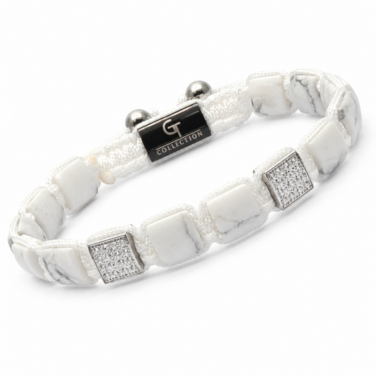 White flat bead bracelet with silver charm tag and square crystal accents