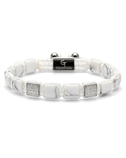 White marble-effect bead bracelet with black logo centerpiece and silver end beads
