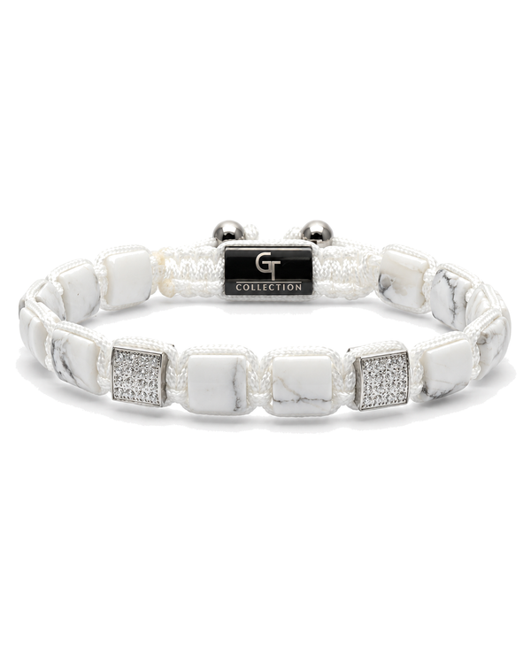 White marble-effect bead bracelet with black logo centerpiece and silver end beads