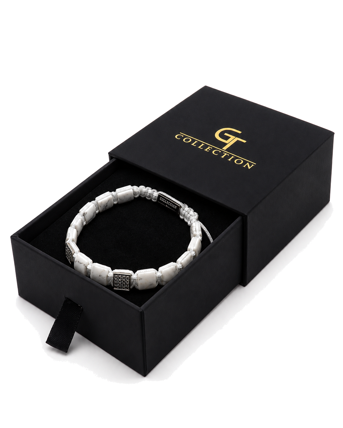 White marble-effect bead bracelet shown in a black gift box