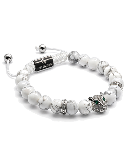 White howlite bead bracelet with silver spacers and green-eyed leopard charm
