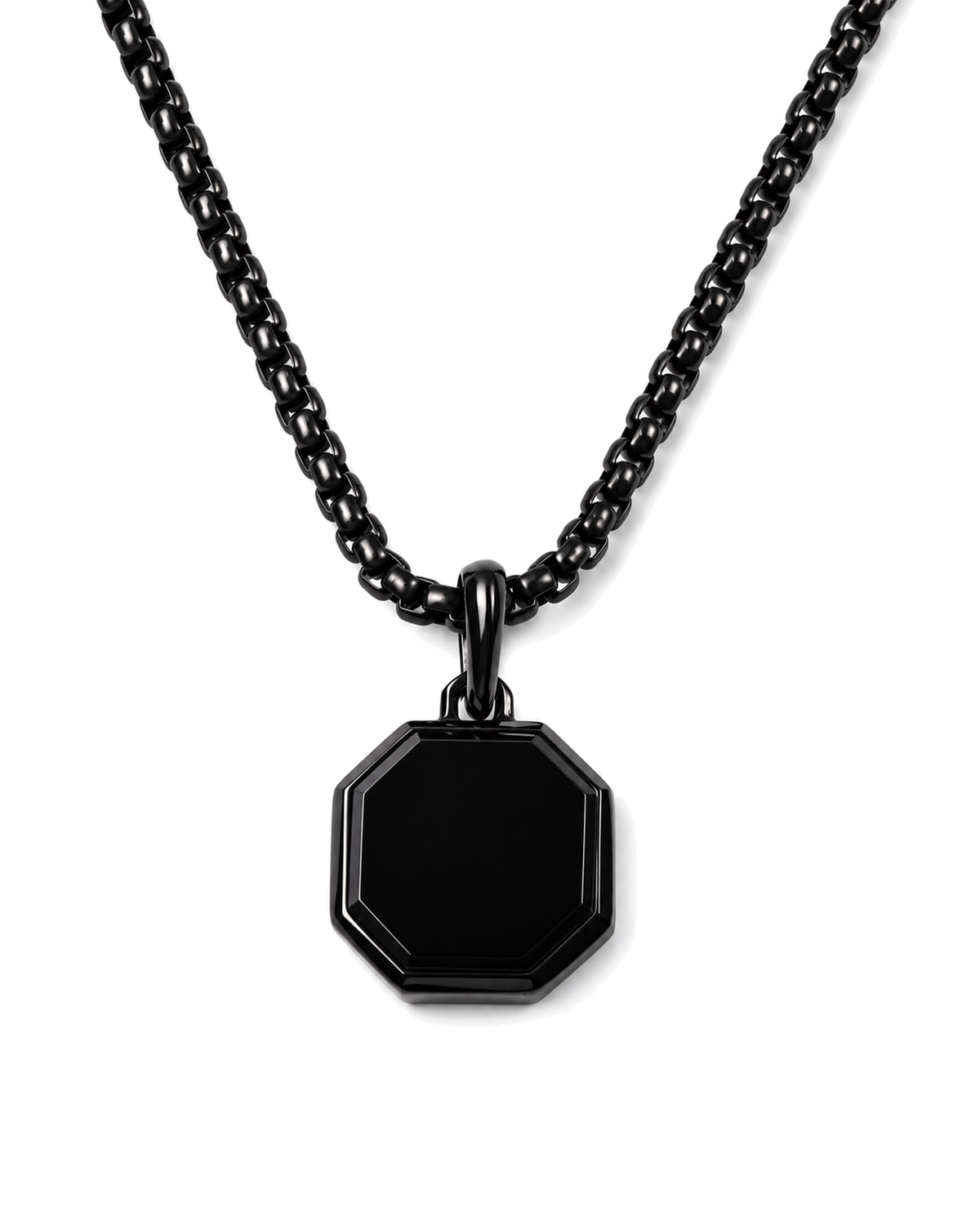 Black octagonal pendant necklace with curb chain on white background