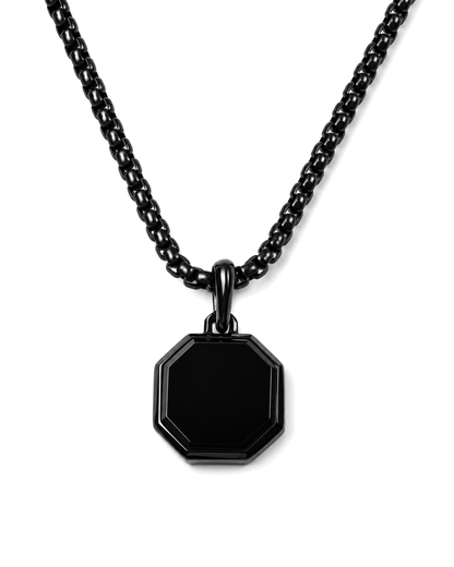 Black octagonal pendant necklace with curb chain on white background