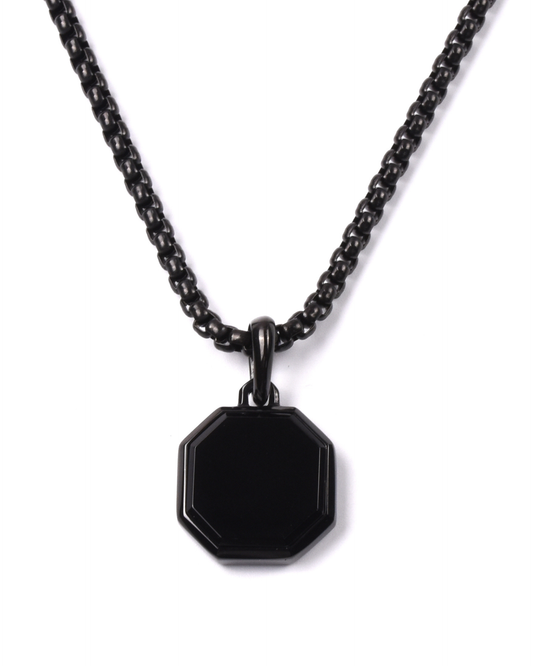 Black steel necklace with black chain and octagonal black pendant at center