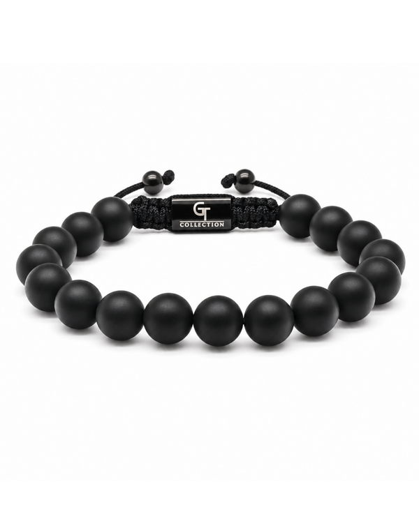 Single-row black bead bracelet with clasp and small toggle charm