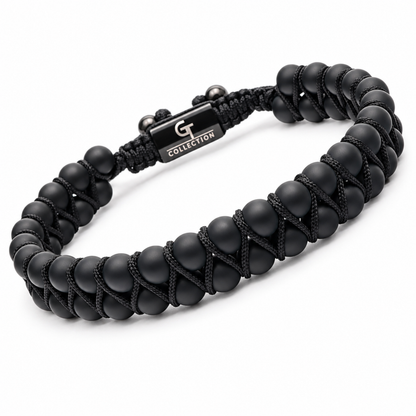 Men's black double bead bracelet with woven cord strap and metal logo tag