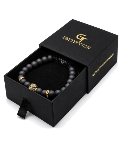 Black bead bracelet with gold leopard centerpiece in black gift box