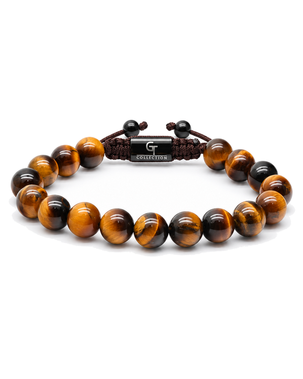 Tiger eye bead bracelet with dark braided cord and center clasp detail